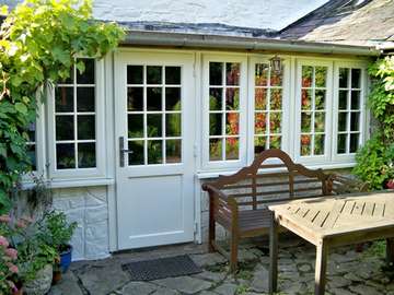 Mr G. - Mere Cheshire : Replacement Kitchen Combination with Evolution Storm windows and doors. Period handles. Astracal Bar to match original porch 